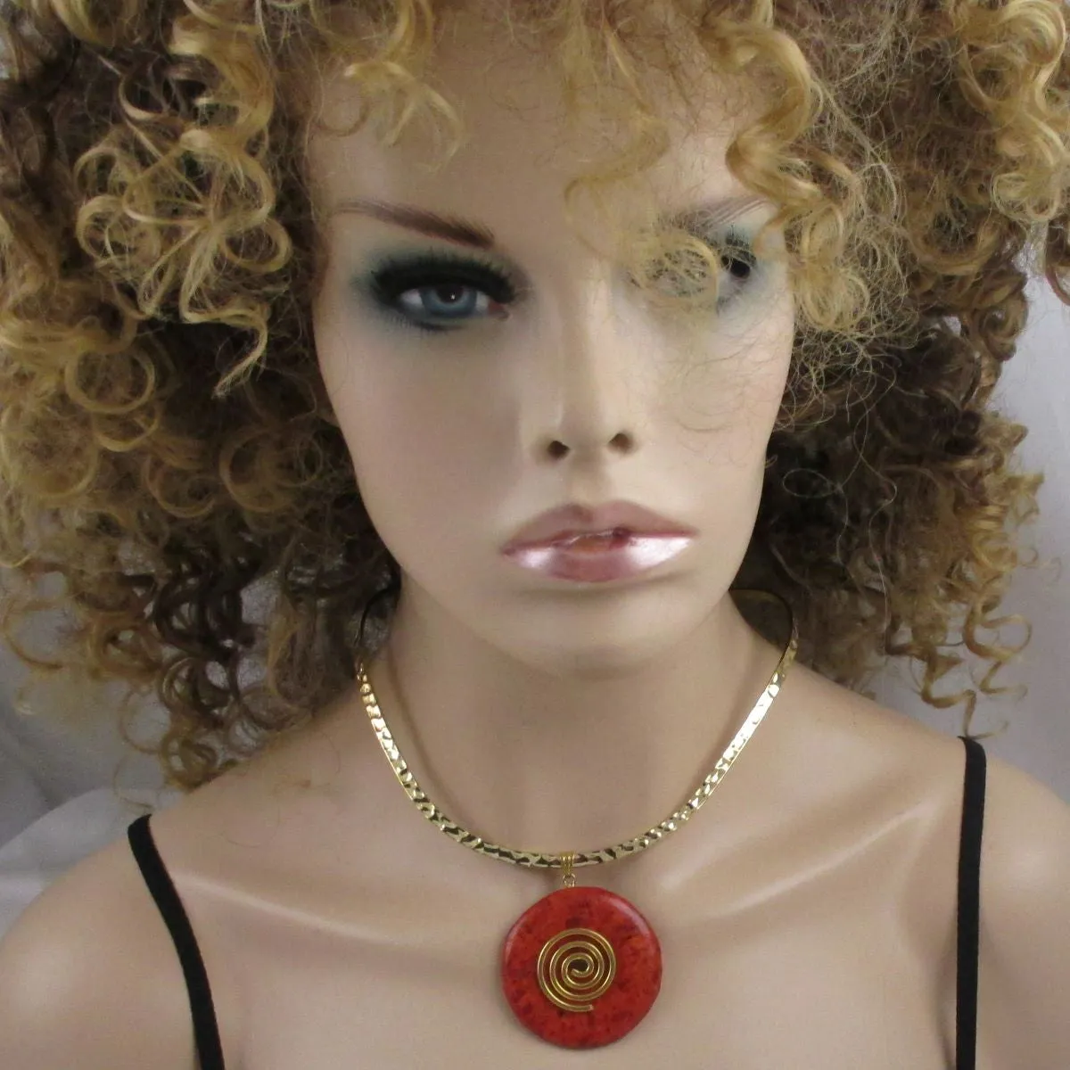 Red Gemstone Pendant on Gold Neck Wire