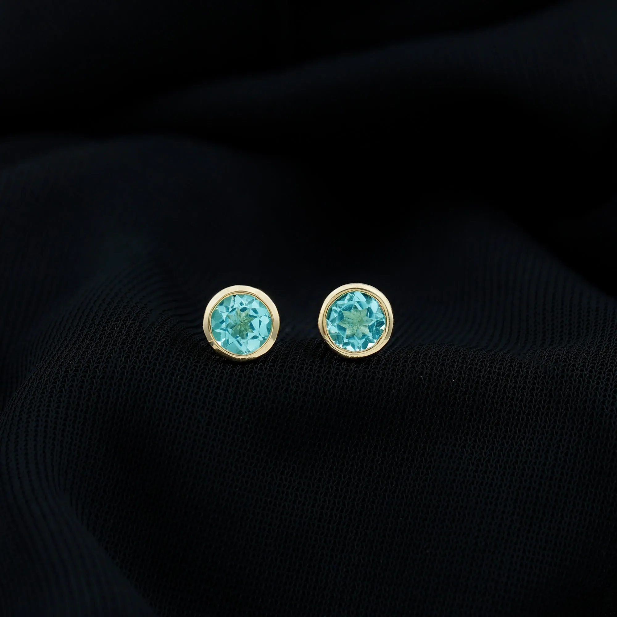 Sky Blue Topaz Solitaire Stud Earrings in Bezel Setting