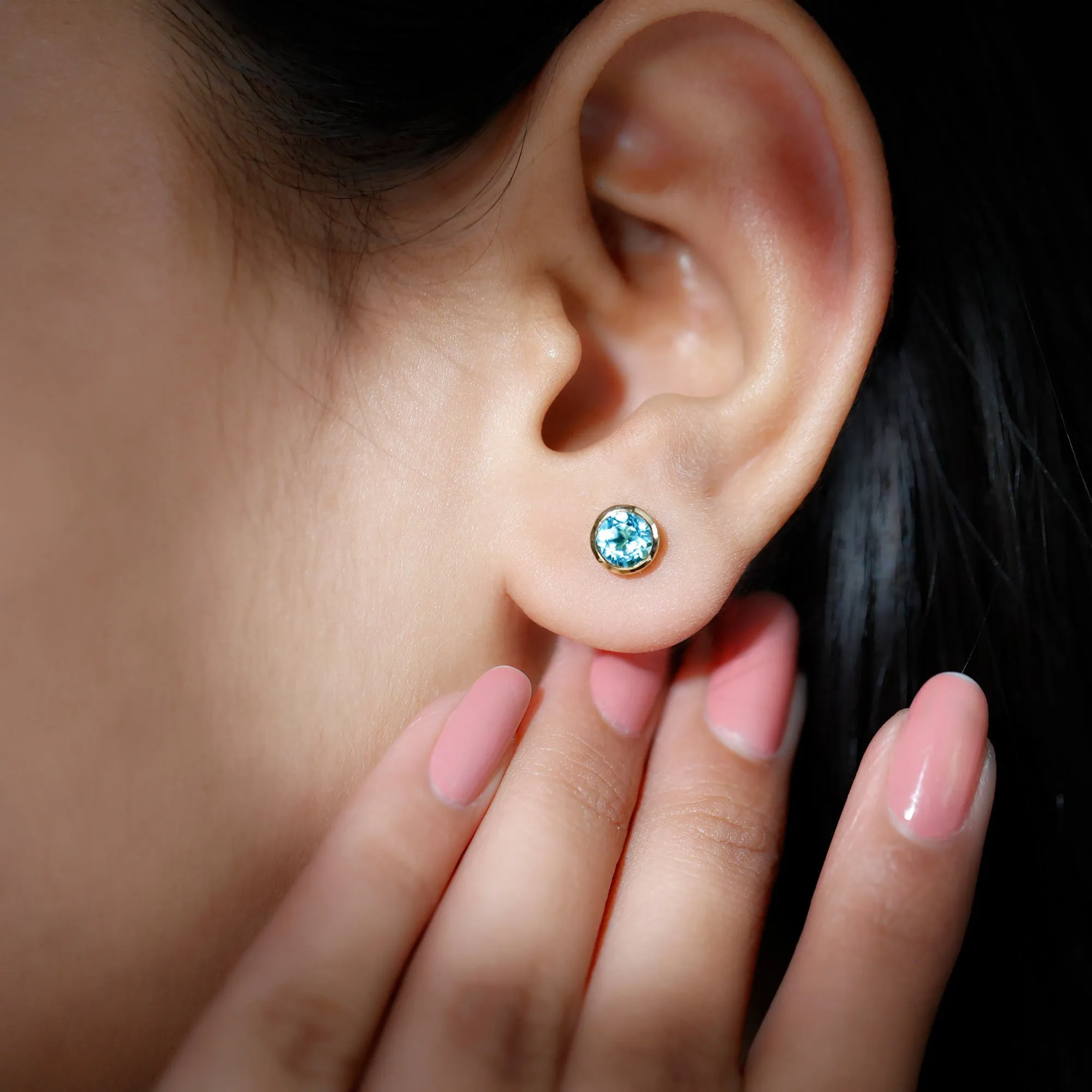 Sky Blue Topaz Solitaire Stud Earrings in Bezel Setting