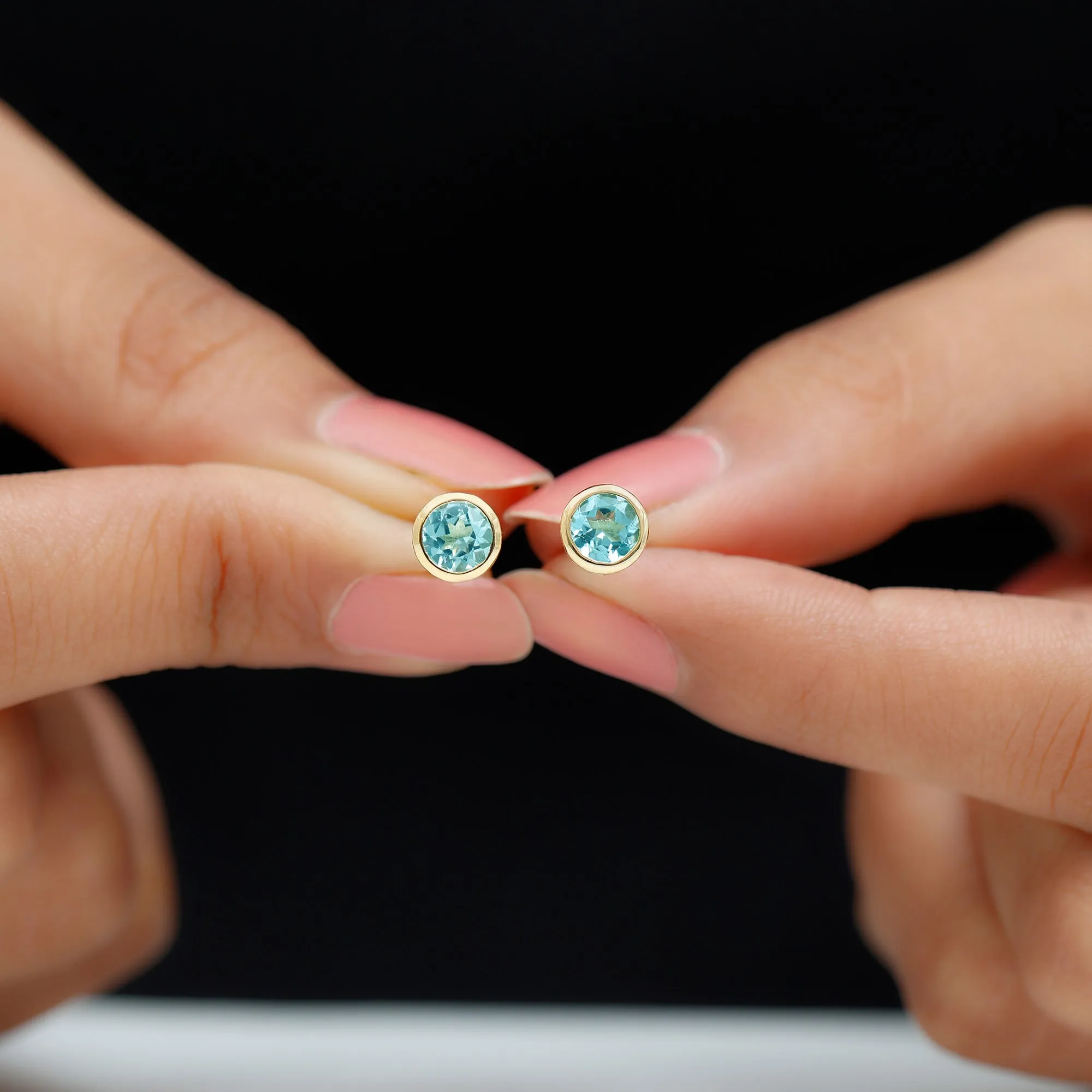 Sky Blue Topaz Solitaire Stud Earrings in Bezel Setting