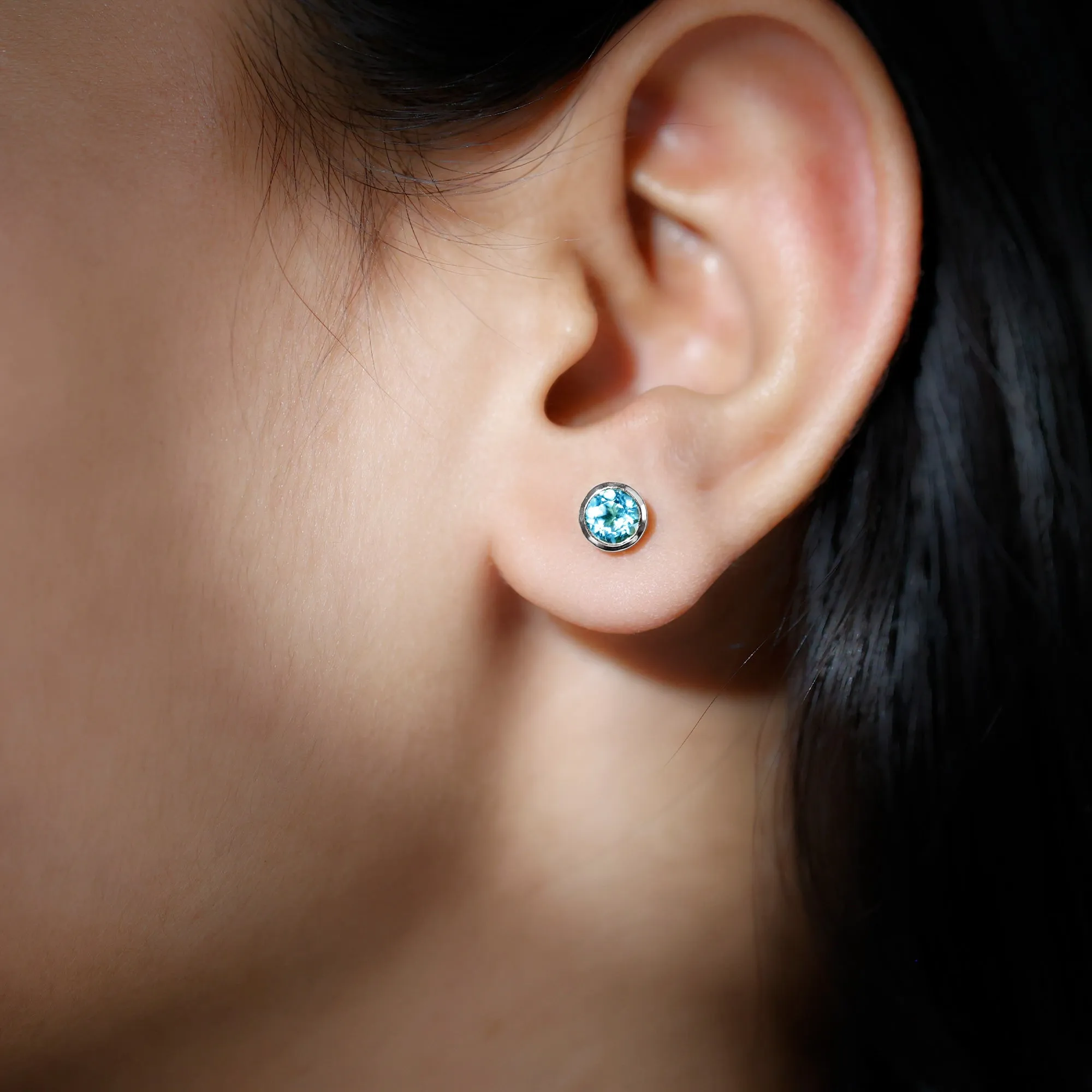 Sky Blue Topaz Solitaire Stud Earrings in Bezel Setting